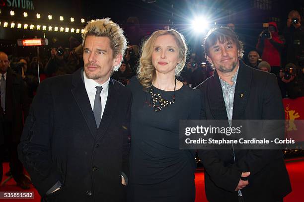 Actors Ethan Hawke, Julie Delpy and director Richard Linklater attend the 'Before Midnight' Premiere during the 63rd Berlinale International Film...