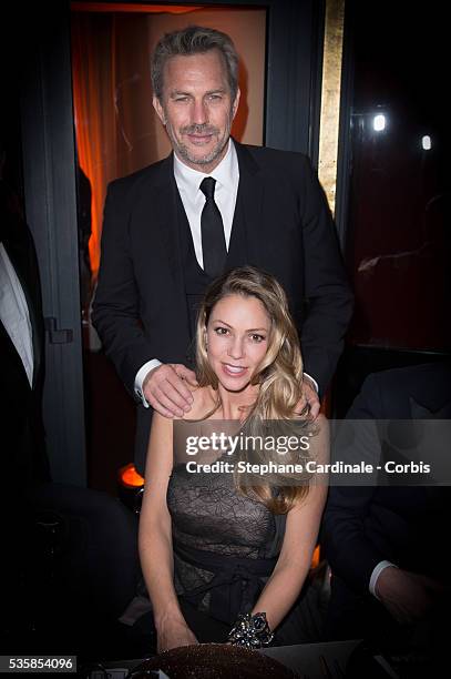 Kevin Costner and his wife Christine Baumgartner attend the Cesar Film Awards Dinner 2013 at Le Fouquet's, in Paris.