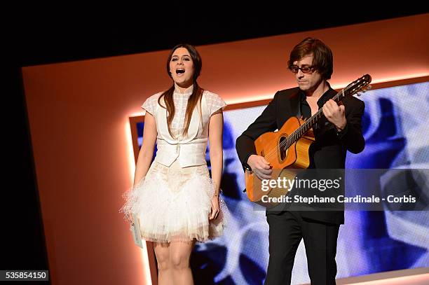 Thomas Dutronc and Emilie Simon perform onstage during the Cesar Awards Ceremony 2013 at Theatre du Chatelet, in Paris.