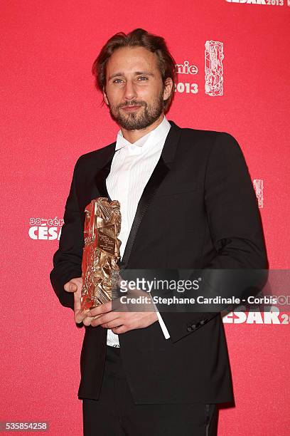 Matthias Schoenaerts poses with his trophy after receiving the Best Newcomer Actor award during the Cesar Film Awards 2013 at Theatre du Chatelet, in...
