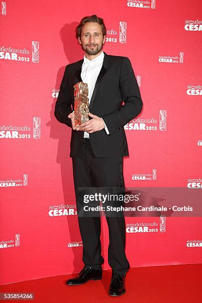 Matthias Schoenaerts poses with his trophy after receiving the Best Newcomer Actor award during the Cesar Film Awards 2013 at Theatre du Chatelet, in...