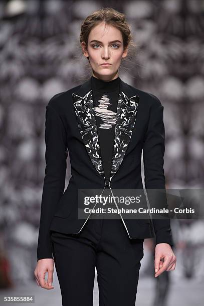 Model walks the runway during the Viktor&Rolf Fall/Winter 2013/14 Ready-to-Wear show as part of Paris Fashion Week, in Paris