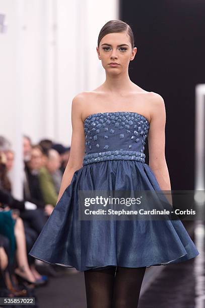 Model walks the runway during the Maxime Simoens Fall/Winter 2013/14 Ready-to-Wear show as part of Paris Fashion Week, in Paris.