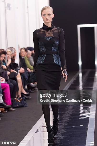 Model walks the runway during the Maxime Simoens Fall/Winter 2013/14 Ready-to-Wear show as part of Paris Fashion Week, in Paris.