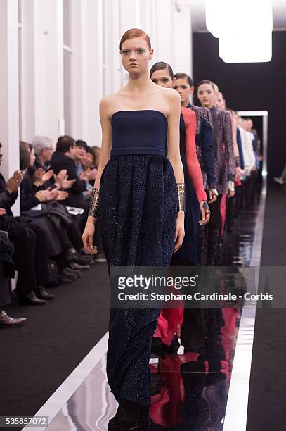 Models walk the runway during the Maxime Simoens Fall/Winter 2013/14 Ready-to-Wear show as part of Paris Fashion Week, in Paris.