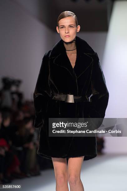 Model walks the runway during Akris Fall/Winter 2013/14 Ready-to-Wear show as part of Paris Fashion Week, in Paris.