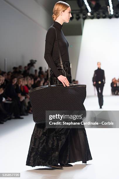 Model walks the runway during Akris Fall/Winter 2013/14 Ready-to-Wear show as part of Paris Fashion Week, in Paris.