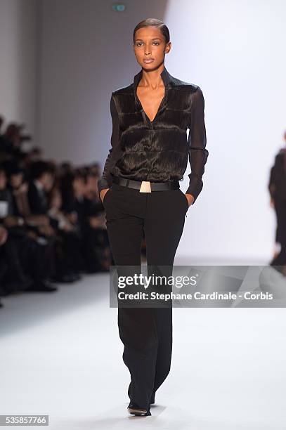 Model walks the runway during Akris Fall/Winter 2013/14 Ready-to-Wear show as part of Paris Fashion Week, in Paris.