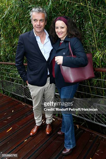 Actors David Brecourt and his companion Alexandra Sarramona attend Day Nine of the 2016 French Tennis Open at Roland Garros on May 30, 2016 in Paris,...