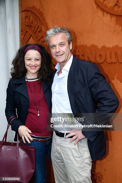 Actors David Brecourt and his companion Alexandra Sarramona attend Day Nine of the 2016 French Tennis Open at Roland Garros on May 30, 2016 in Paris,...