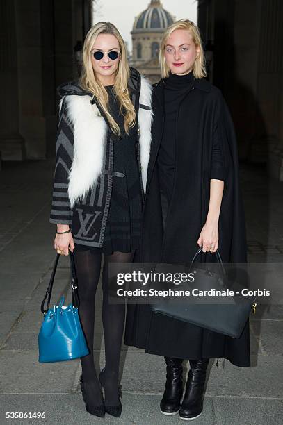 Claire Courtin-Clarins and Virginie Courtin-Clarins attend the Louis Vuitton Fall/Winter 2013/14 Ready-to-Wear show as part of Paris Fashion Week, in...