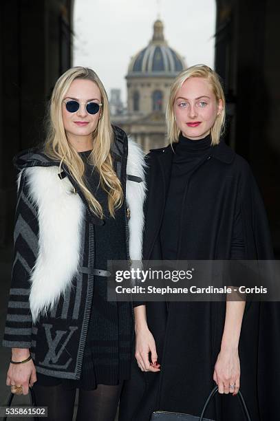 Claire Courtin-Clarins and Virginie Courtin-Clarins attend the Louis Vuitton Fall/Winter 2013/14 Ready-to-Wear show as part of Paris Fashion Week, in...