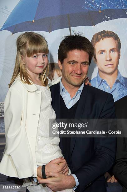 Productor Kris Thykier with his daughter and Actress Mathilda Thykier attend 'Mariage A l'Anglaise' Premiere, held at Cinema UGC Normandie, in Paris.