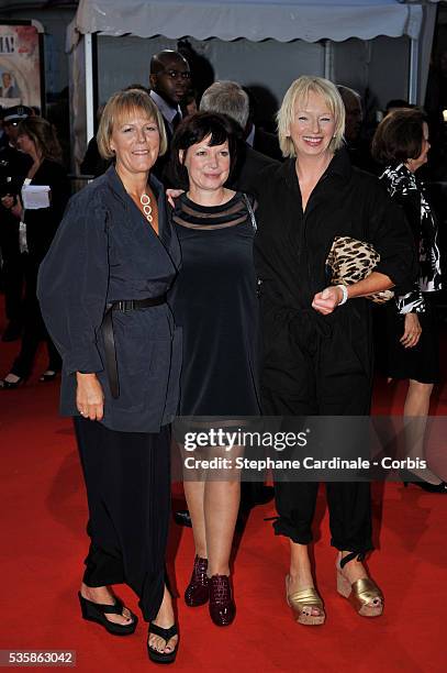 Catherine Johnson, Phyllida Llyod and Judy Cramer attend the premiere of "Mamma Mia" during the 34th Deauville Film Festival.