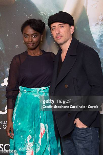 Aissa Maiga and Gad Elmaleh attend the 'L'Ecume Des Jours' Paris Premiere at Cinema UGC Normandie, in Paris.
