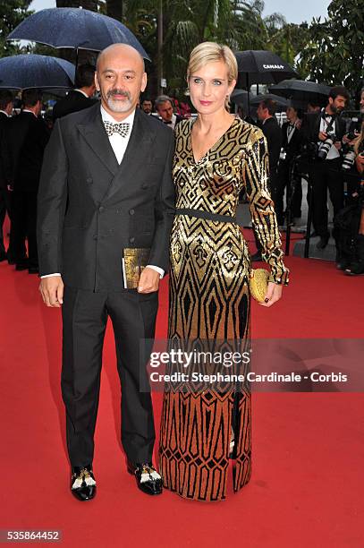 Christian Louboutin and Melita Toscan du Plantier attend the Opening Ceremony and 'The Great Gatsby' Premiere during the 66th Cannes International...