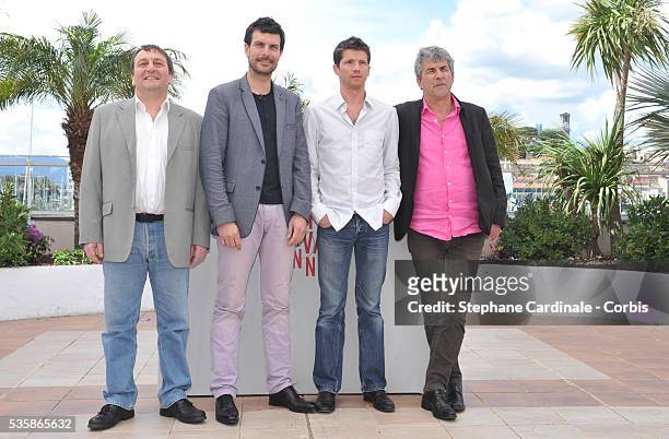 Actor Patrick d'Assumcao, actor Christophe Paou, actor Pierre Deladonchamps and director Alain Guiraudie attend 'L'Inconnu du lac' photo call during...