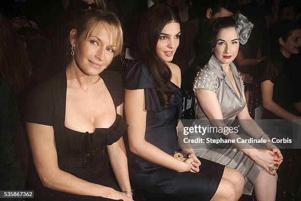 Estelle Lefebure, Bojana Panic, and Dita Von Teese attend the Christian Dior Haute Couture Spring/Summer 2009 Collection fashion show at Paris...