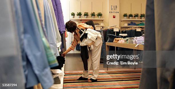 Maria Hernandez shops for clothing in Gap's new Forth & Towne store at Old Orchard Mall August 31, 2005 in Skokie, Illinois. Forth & Towne opened...