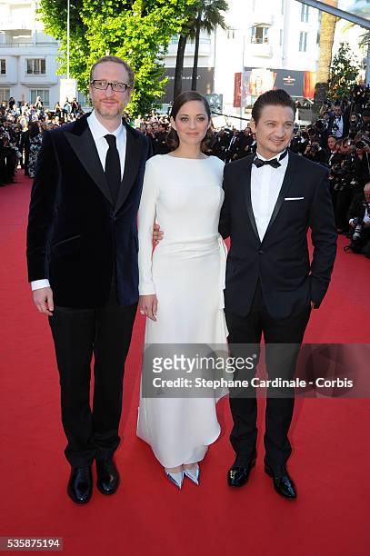 Director James Gray, actors Jeremy Renner and Marion Cotillard attend the 'The Immigrant' premiere during the 66th Cannes International Film Festival.
