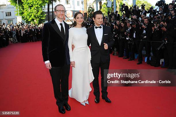 Director James Gray, actors Jeremy Renner and Marion Cotillard attend the 'The Immigrant' premiere during the 66th Cannes International Film Festival.