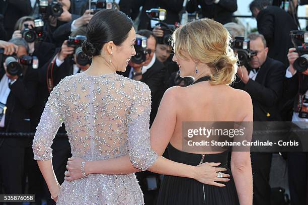 Zhang Ziyi and Ludivine Sagnier attend the 'La Venus A La Fourrure' premiere during the 66th Cannes International Film Festival.