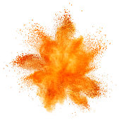 orange powder explosion isolated on white
