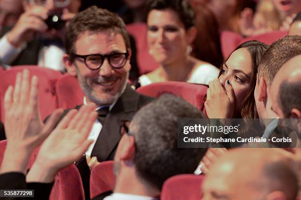 Actress Berenice Bejo reacts with actor Elyes Aguis and her husband director Michel Hazanavicius , after it is announced that she won the Prix...