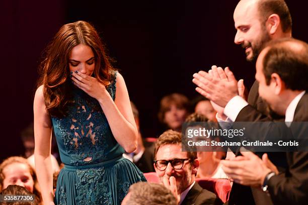 Actress Berenice Bejo reacts with actor Elyes Aguis and her husband director Michel Hazanavicius , after it is announced that she won the Prix...