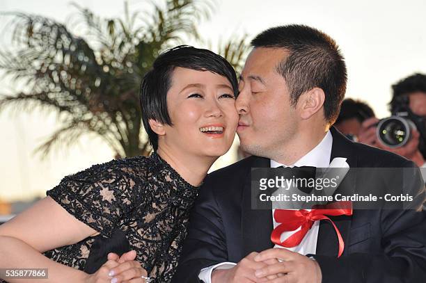 Actress Tao Zhao and director Jia Zhangke, winner of 'Prix du Scenario' for 'Tian Zhu Ding' attend the 'Palme D'Or Winners Photocall' during the 66th...