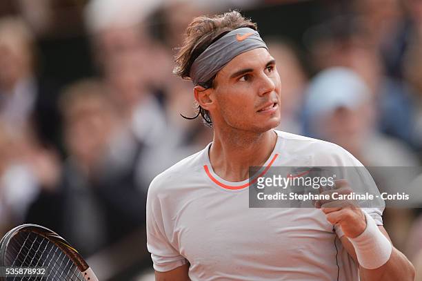Rafael Nadal of Spain celebrates a point in his Men's Singles match against Fabio Fognini of Italy during day seven of the French Open at Roland...