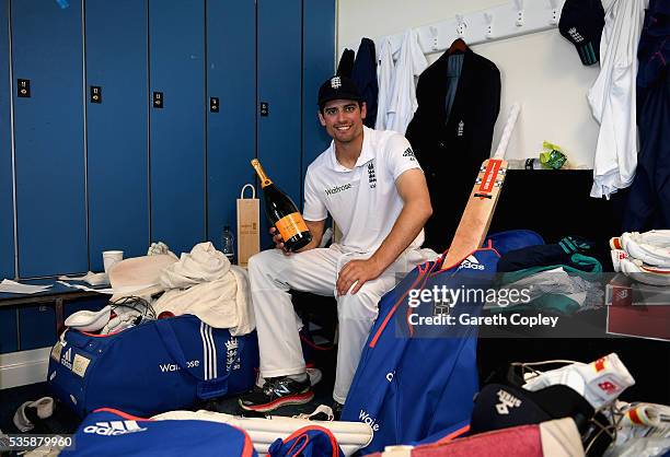 England captain Alastair Cook relaxes in the dressing room after reaching 10,000 test runs and winning the 2nd Investec Test match between England...