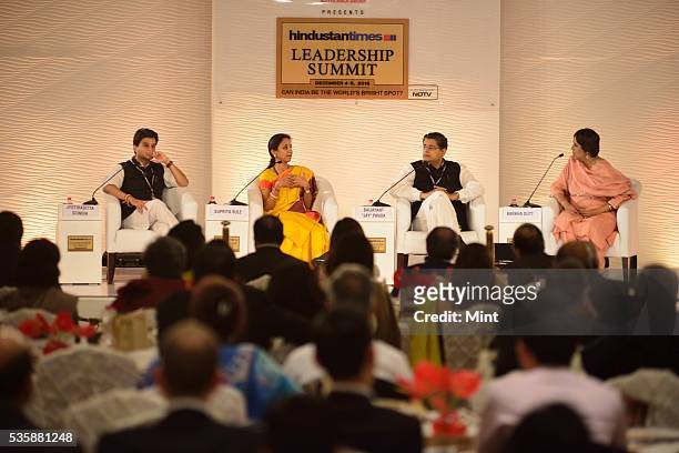 Congress leader Jyotiraditya Scindia, NCP MP Supriya Sule and BJD MP Baijayant Jay Panda with Barkha Dutt during session on 'The Challenges Before...