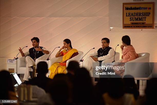 Congress leader Jyotiraditya Scindia, NCP MP Supriya Sule and BJD MP Baijayant Jay Panda with Barkha Dutt during session on 'The Challenges Before...