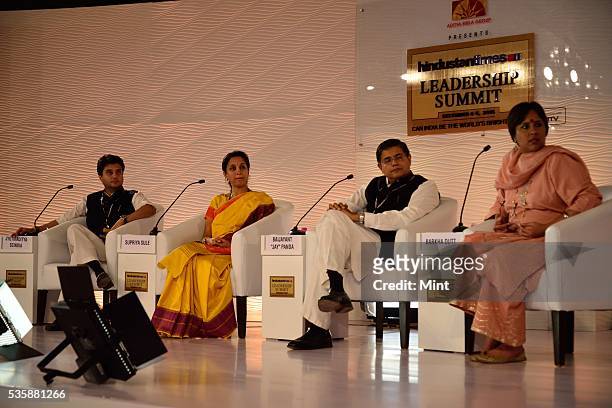 Congress leader Jyotiraditya Scindia, NCP MP Supriya Sule and BJD MP Baijayant Jay Panda with Barkha Dutt during session on 'The Challenges Before...