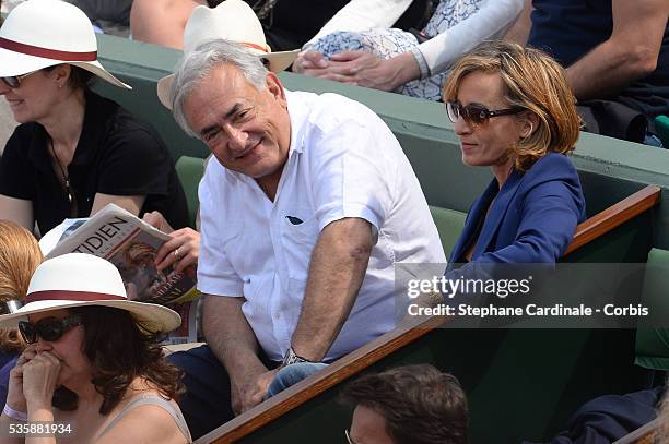 Dominique Strauss-Khan and Myriam L'Aouffir attend Roland Garros Tennis French Open 2013.