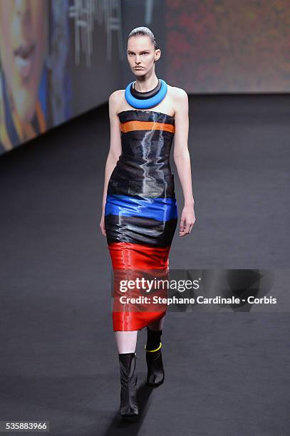 Model walks the runway during Christian Dior show as part of Paris Fashion Week Haute-Couture Fall/Winter 2013-2014, in Paris.