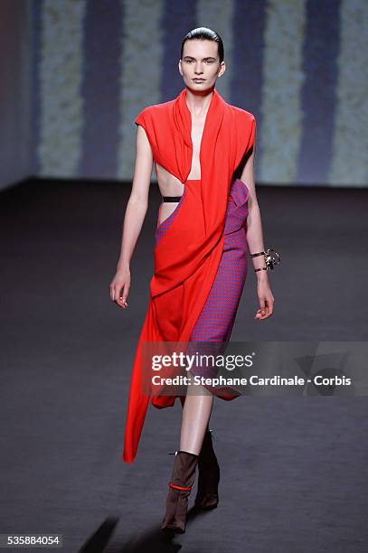 Model walks the runway during Christian Dior show as part of Paris Fashion Week Haute-Couture Fall/Winter 2013-2014, in Paris.