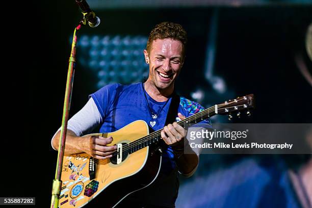 Chris Martin from Coldplay performs on stage at Powderham Castle on May 29, 2016 in Exeter, England.