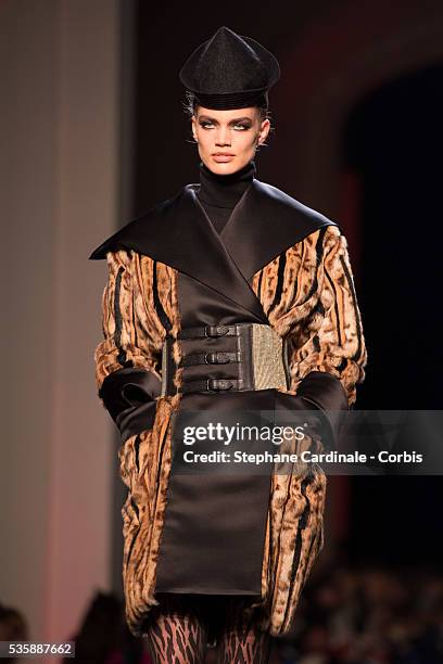 Model walks the runway during the Jean Paul Gaultier show as part of Paris Fashion Week Haute-Couture Fall/Winter 2013-2014, on July 3 in Paris