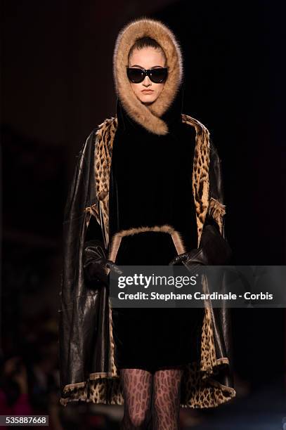 Model walks the runway during the Jean Paul Gaultier show as part of Paris Fashion Week Haute-Couture Fall/Winter 2013-2014, on July 3 in Paris