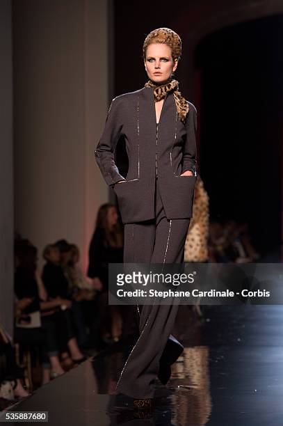 Model walks the runway during the Jean Paul Gaultier show as part of Paris Fashion Week Haute-Couture Fall/Winter 2013-2014, on July 3 in Paris
