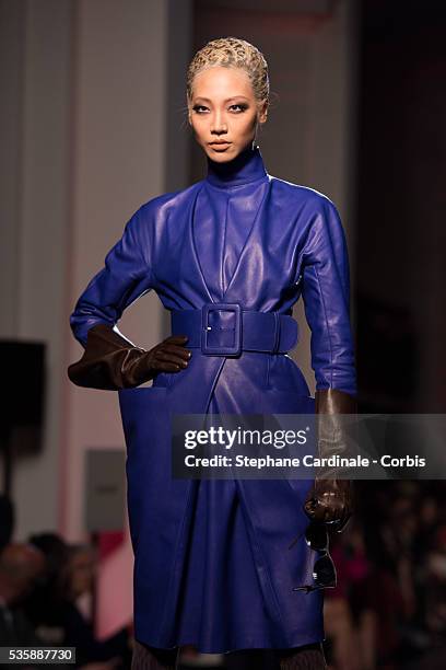 Model walks the runway during the Jean Paul Gaultier show as part of Paris Fashion Week Haute-Couture Fall/Winter 2013-2014, on July 3 in Paris