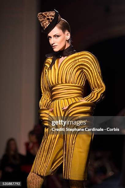 Model walks the runway during the Jean Paul Gaultier show as part of Paris Fashion Week Haute-Couture Fall/Winter 2013-2014, on July 3 in Paris