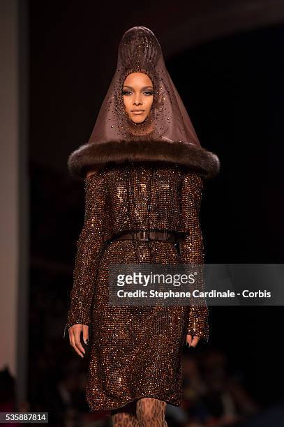 Model walks the runway during the Jean Paul Gaultier show as part of Paris Fashion Week Haute-Couture Fall/Winter 2013-2014, on July 3 in Paris