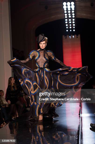 Model walks the runway during the Jean Paul Gaultier show as part of Paris Fashion Week Haute-Couture Fall/Winter 2013-2014, on July 3 in Paris