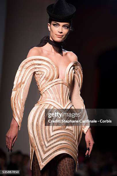 Model walks the runway during the Jean Paul Gaultier show as part of Paris Fashion Week Haute-Couture Fall/Winter 2013-2014, on July 3 in Paris