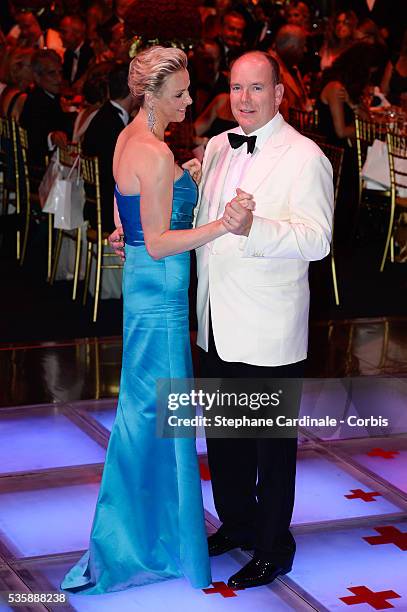 Princess Charlene of Monaco and Prince Albert II of Monaco dance during the 65th Monaco Red Cross Ball Gala at Sporting in Monaco.