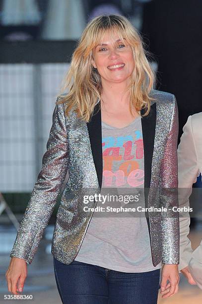 Emmanuelle Seigner attends the 'Blue Jasmine' Paris premiere at UGC Cine Cite Bercy on August 27, 2013 in Paris