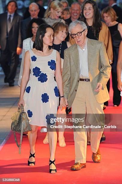 Director Woody Allen and wife Soon-Yi Previn attend the 'Blue Jasmine' Paris premiere at UGC Cine Cite Bercy on August 27, 2013 in Paris